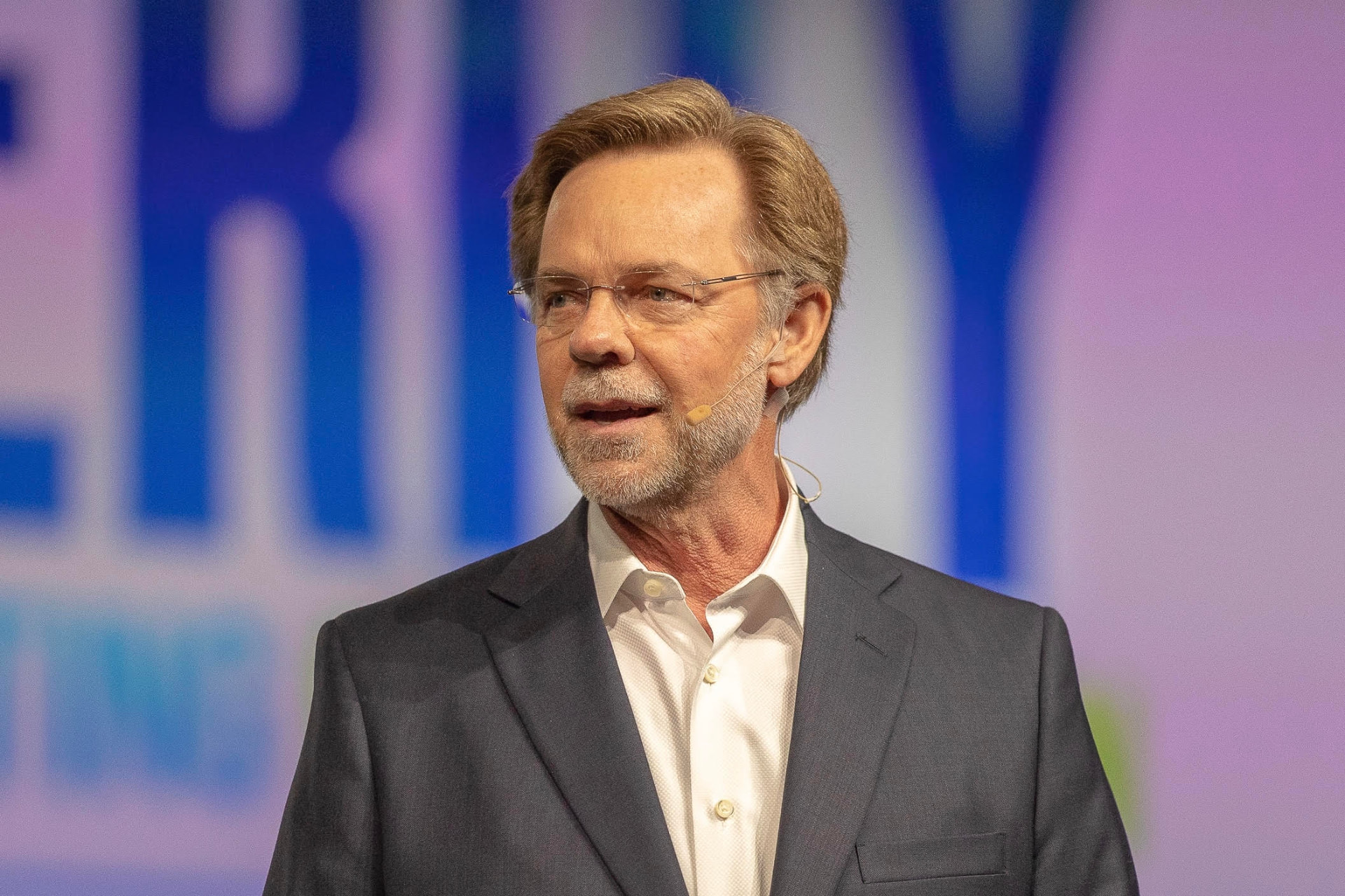 Larry Shaffer speaking on stage